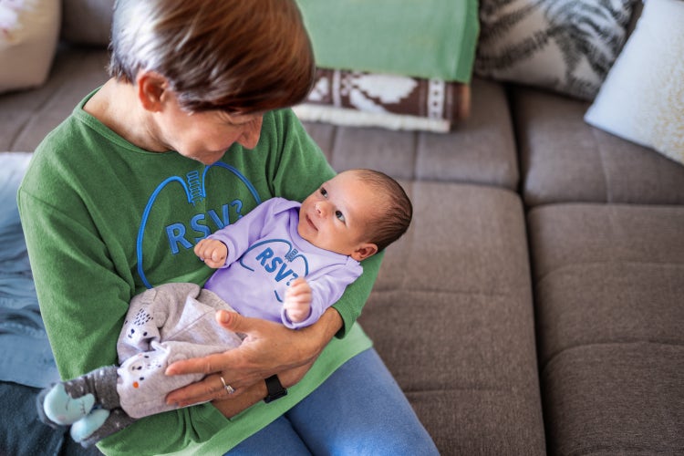 Shirt with “RSV?” on an adult Shirt with “RSV?” on an infant